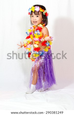 Asian Chinese little girl in hawaiian costume