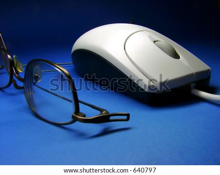 Computer mouse & eye glasses.