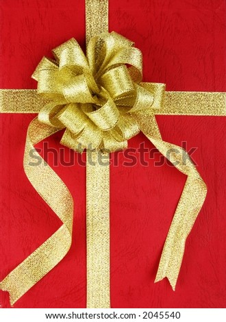 Red gift box with ribbon.