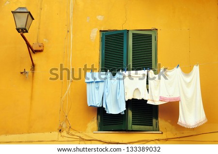Typical Italian house with washing hanging on a line