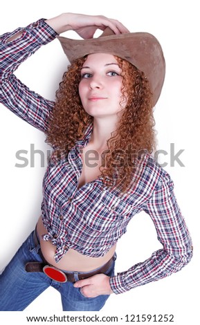 pretty curly girl cowboy posing