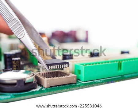 assembly repair tweezers computer parts and motherboard