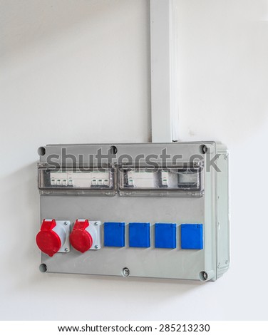 electrical switch on the white  wall closeup