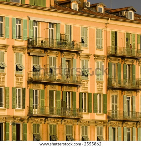 typical front of house in Nice with french flag on a balcony