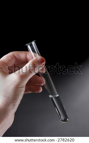 test tube in hand test tube in hand