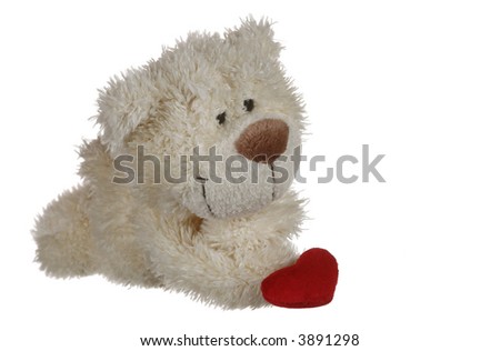 teddy bear with lots of stuffed fabric hearts