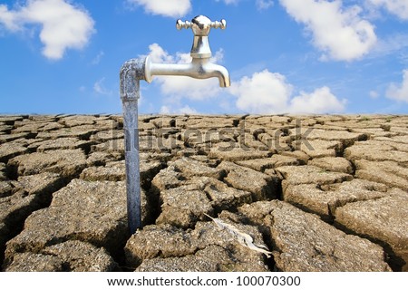 Water Faucet on Dry Soil Texture