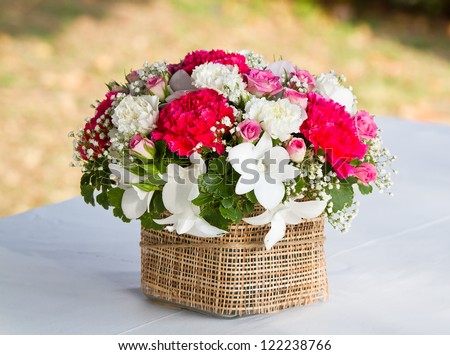 beautiful bouquet of bright wildflowers in basket