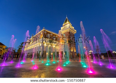 coloured jets water of fountain and the Main Guard building by night in the Venezie Huahin Thailand