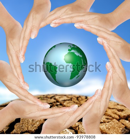 Earth in circle hands, concept of saving energy