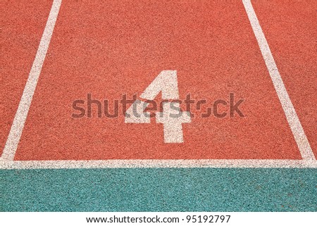 Number one on the start of a running track