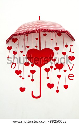 umbrella with heart drops painting on wall