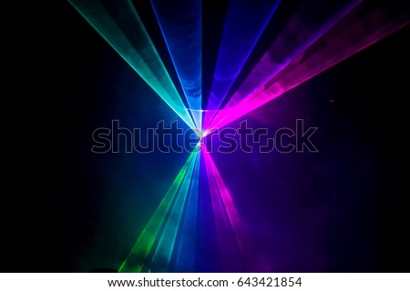 Lights show. Lazer show. Night club dj party people enjoy of music dancing sound with colorful light. club night light dj party club. With Smoke Machine and lights.