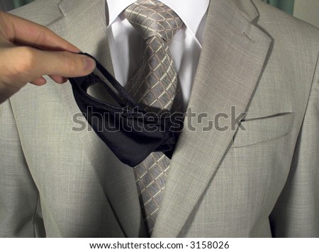Woman\'s hand pulls a girl\'s pants out of the man\'s suit pocket (Morning question 3)