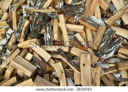 stack of birch firewood background texture