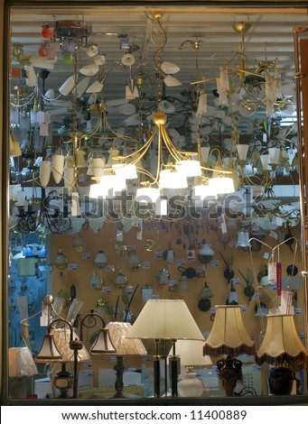 lamps shop window with single lamp switched on