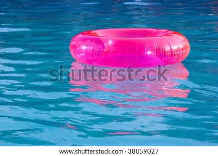 rubber ring in the swimming pool sunny day