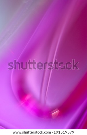 Abstract background with a macro shot of a pink tube