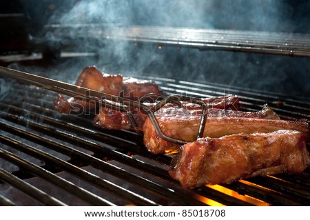 Grilled smoked pork ribs. A popular food for people who like to eat pork.
