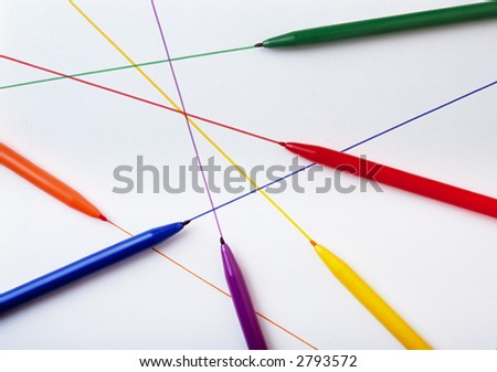 Assortment of colored fine-tipped marking pens on a white background with intersecting lines projecting from their tips.