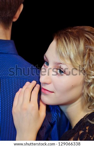 Closeup face of dreaming girl on a shoulder of her love man