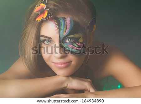 Photo of beautiful fashion woman color face with butterfly style
