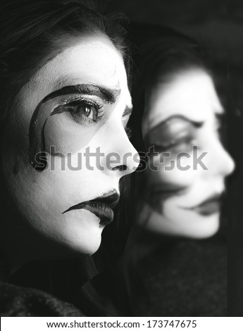 Black And White Photo Of Woman With A Mask Makeup