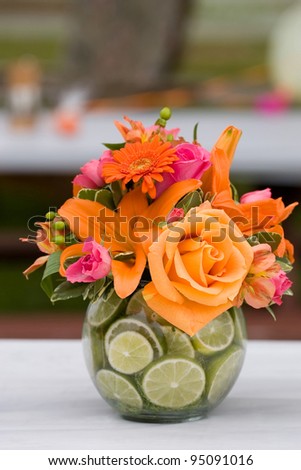 stock photo Wedding centerpiece with orange roses and gerbera daisies