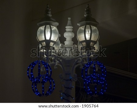 Four-lantern lightpost - dark, no light blowout - lantern detail - blue light ball Christmas decorations