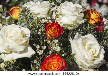 White and orange roses