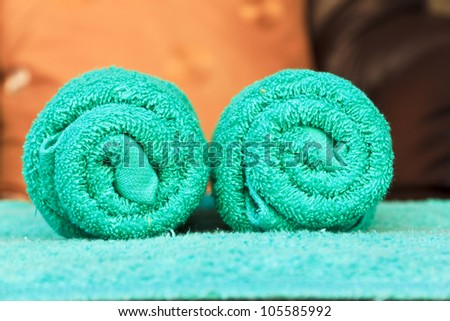 Close-up of fluffy soft green cotton spa towel.