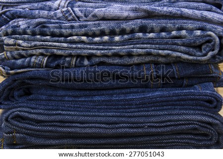 Stack of blue jeans denim discount sale sell second hand