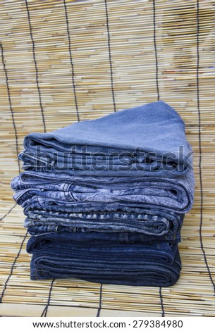Stack of blue jeans denim discount sale sell second hand