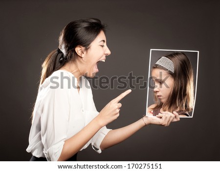 concept of woman telling off a little girl