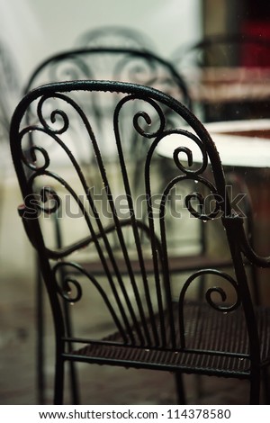 Beautiful old chair in street cafe in Tuscany