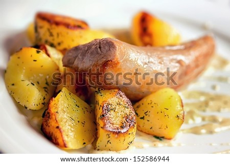Pork tenderloin baked potatoes and vegetables