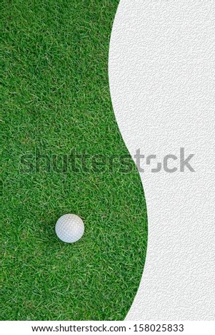 White golf ball on green grass background