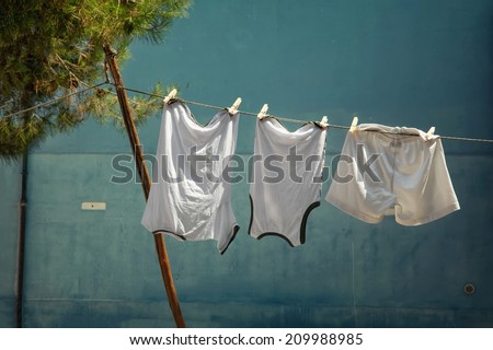Laundry hanging out to dry outdoors in summer