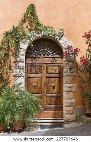 Front door of a beautiful and old villa in Tuscany