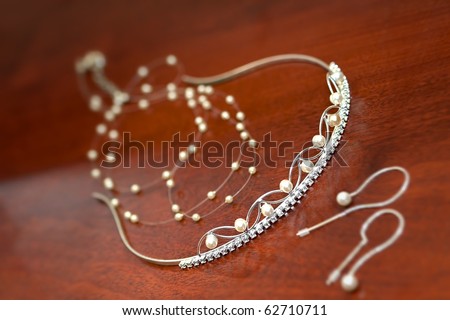 stock photo Close up wedding tiara on wood background