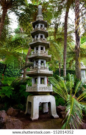 Japanese pagoda in a tropical garden