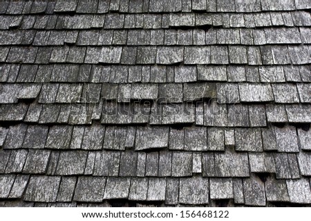 Wooden tiles on the roof of  house