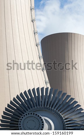 Steam turbine against nuclear power plant. Conceptual image of nuclear energy