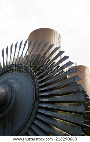 Steam turbine against nuclear power plant Conceptual image of nuclear energy