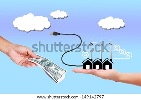 Image of wind turbine generating electricity with money in hand   on sky background.