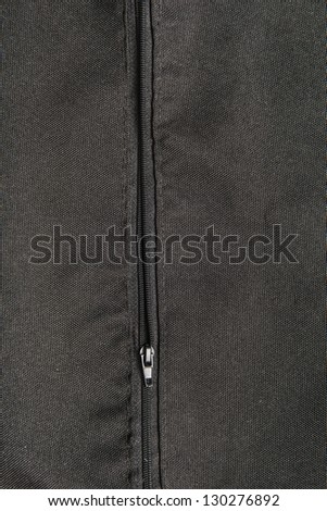 Backdrop canvas of black cotton fabric with opened zipper