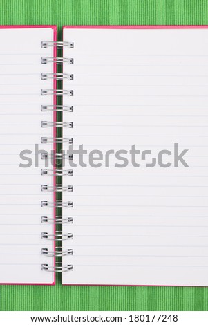 Open notebook with blank white ruled pages