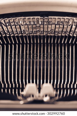 Retro vintage typewriter. Conceptual image of old fashioned office work, communication or writing.