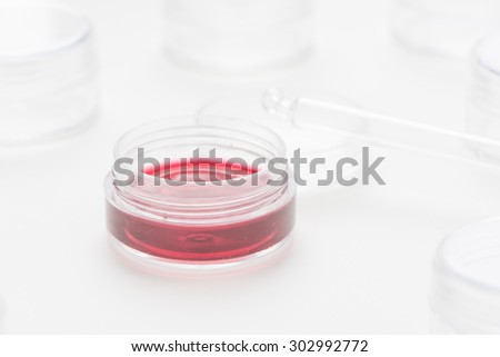 Lab research with fluids. Conceptual image of clinical testing, scientific analysis and health science.