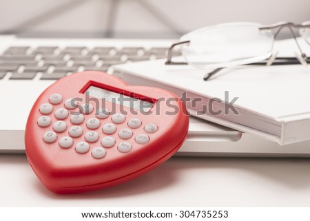 Calculator and pencil. Office equipment at workplace. Conceptual image of desk work, financial paperwork and business economy.